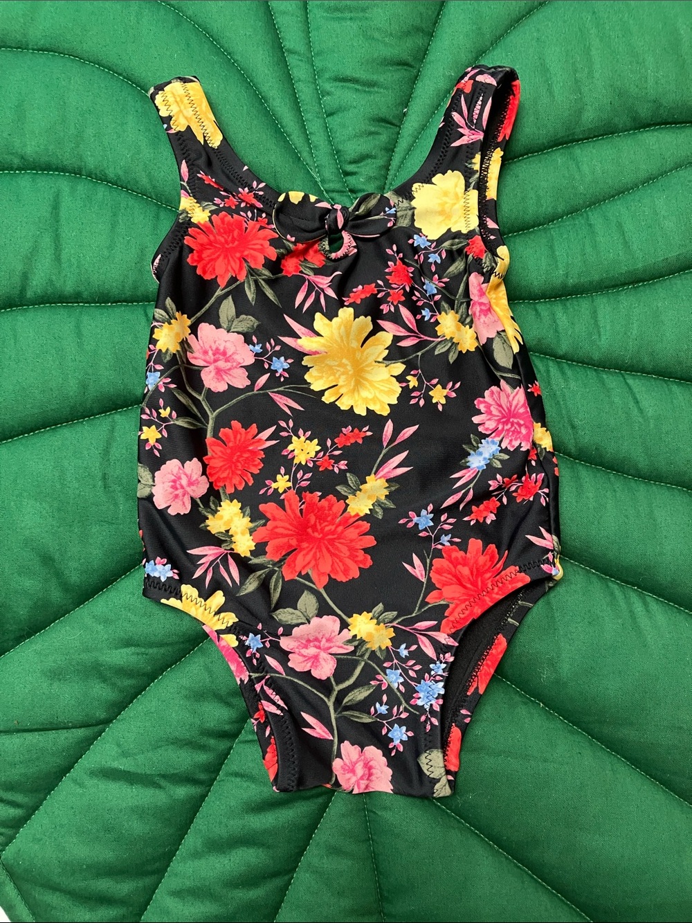 NWOT old navy infant one piece black floral swimsuit. Size 6-12mos